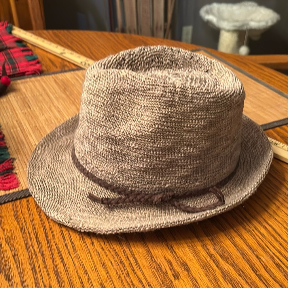 Beige Cloth weaved Hat With leather braided trim. One size